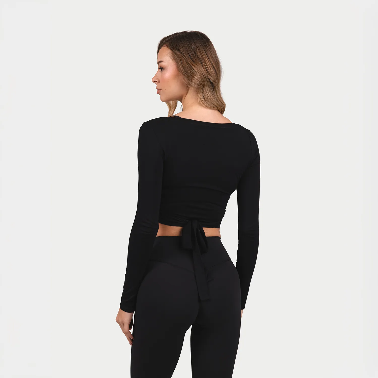 MRIIÀ Sculpt Luxe Bodycon Wrap Top schwarz Langarm Größe wählen
